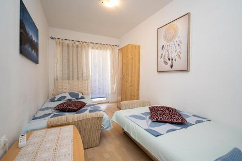 Apartments by the sea Vir - 21081