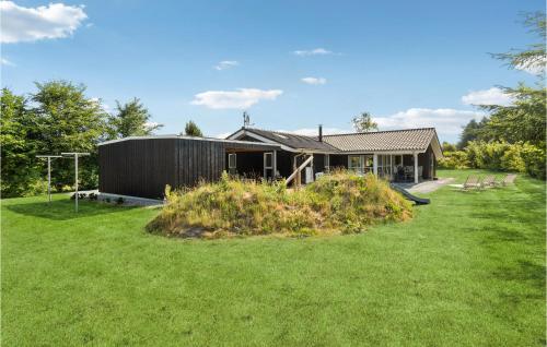 a house with a large yard in front of it at Gorgeous Home In Fjerritslev With Sauna in Fjerritslev