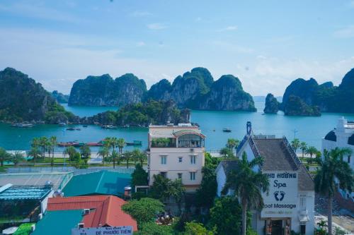 a view of halong bay with limestone islands in the water at Osaka Ha Long Hotel in Ha Long