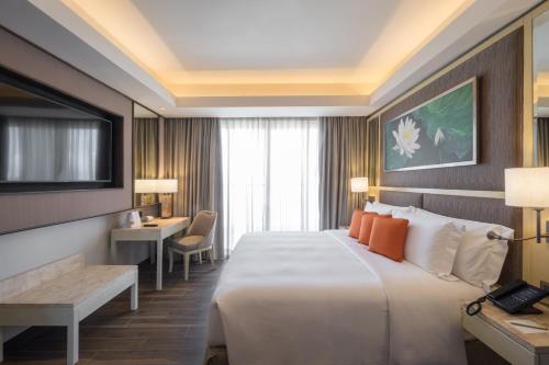 Cama o camas de una habitación en Dusit Thani Mactan Cebu Resort