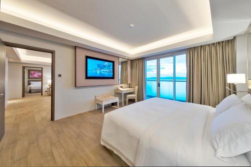 Cama o camas de una habitación en Dusit Thani Mactan Cebu Resort