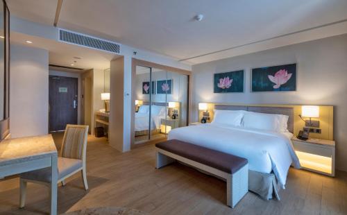 Cama o camas de una habitación en Dusit Thani Mactan Cebu Resort