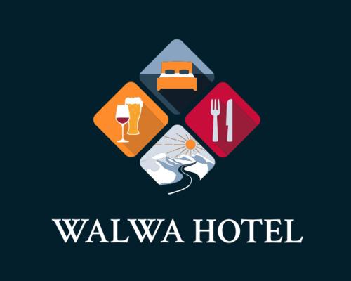 a logo for a hotel with a table and food at Walwa Hotel 