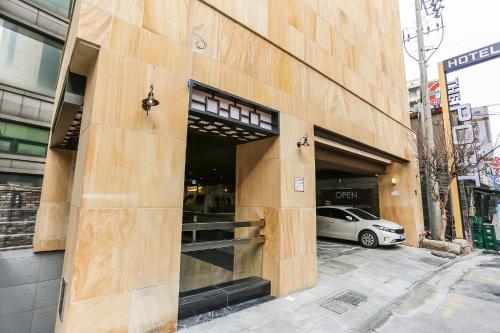 a car is parked inside of a building at The Post Hotel in Seoul