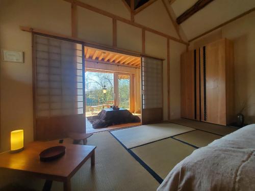 Postel nebo postele na pokoji v ubytování Domaine de la Boderie