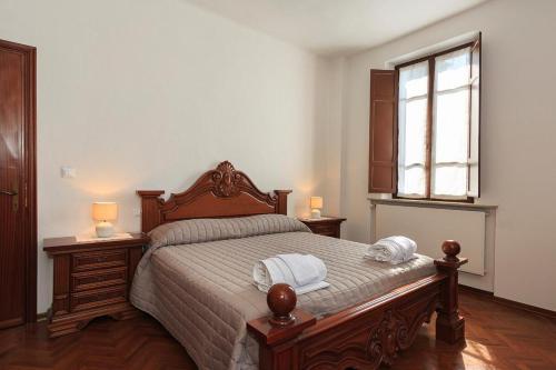 Postel nebo postele na pokoji v ubytování Locanda Da Romano