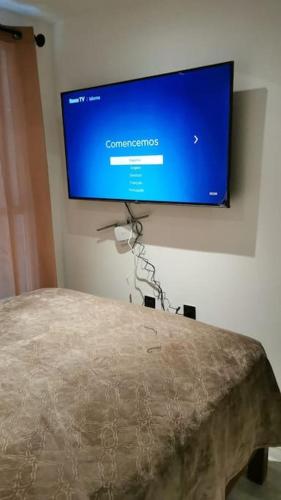 a flat screen tv hanging on a wall at Contenedores Maritimos in Mexico City