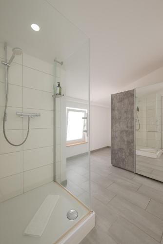Bilik mandi di Apartments an der Arena Leipzig