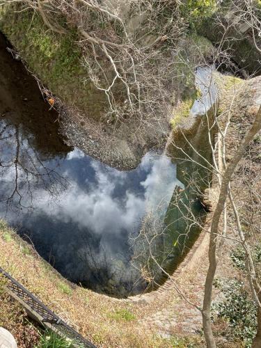 a reflection of the sky in a body of water at Children's cafe B&B Kimie in Kamakura