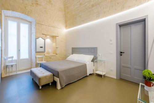 Ένα ή περισσότερα κρεβάτια σε δωμάτιο στο Murr Luxury Rooms