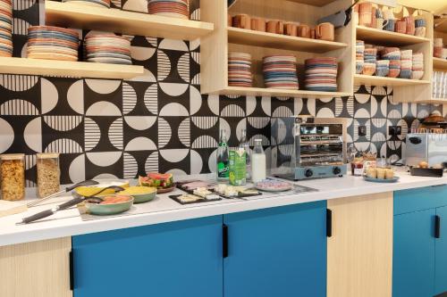 Η κουζίνα ή μικρή κουζίνα στο Ibis Styles Miramas