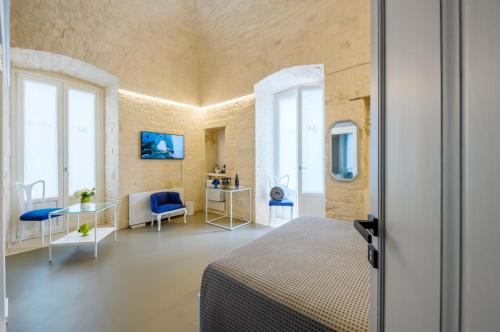 Μια τηλεόραση ή/και κέντρο ψυχαγωγίας στο Murr Luxury Rooms