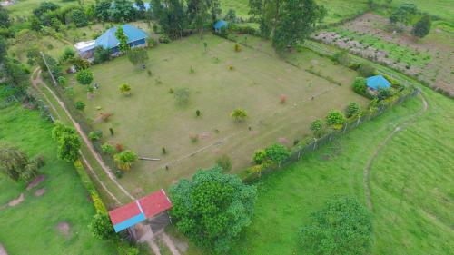 an aerial view of a park with people in it at Muga Eco Village in Ntungamo