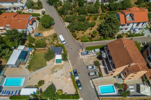 an aerial view of a house with a yard at Bellona in Malinska