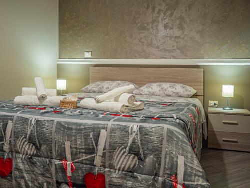 a bedroom with a bed with christmas decorations on it at Villa Paestum in Paestum