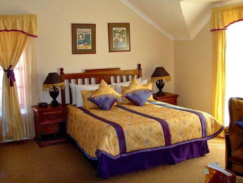 Katil atau katil-katil dalam bilik di Lake Clarens Guest House