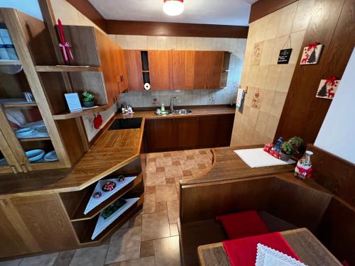 an overhead view of a kitchen with wooden cabinets at Villa Tisot in Siror