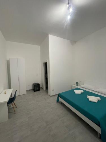 Postel nebo postele na pokoji v ubytování Borraco Rooms