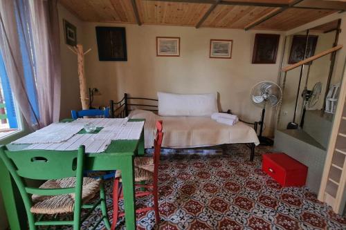 Ένα ή περισσότερα κρεβάτια σε δωμάτιο στο SOULIS GUESTHOUSE