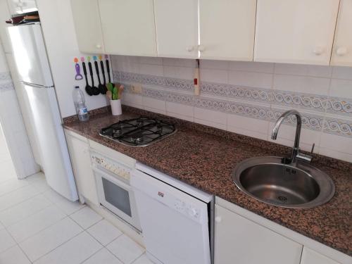 Kuchyň nebo kuchyňský kout v ubytování Residencial Les Motes Solo Familias