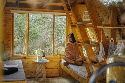 Posezení v ubytování Gaia A-frame cabin