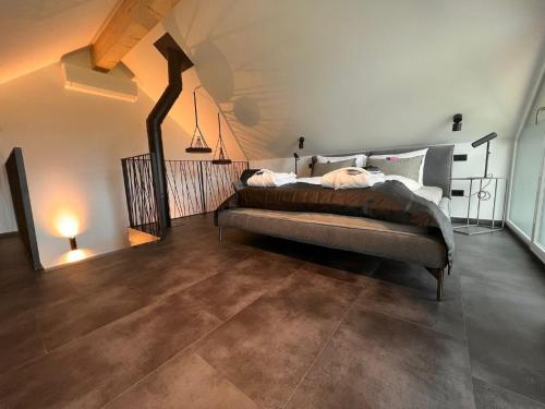Ένα ή περισσότερα κρεβάτια σε δωμάτιο στο Chalet Deluxe