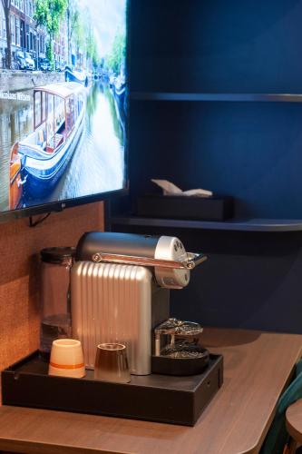ホテル ニコラス ウィッツェンにあるコーヒーまたはお茶