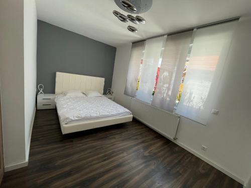 Katil atau katil-katil dalam bilik di Bagoly Apartman