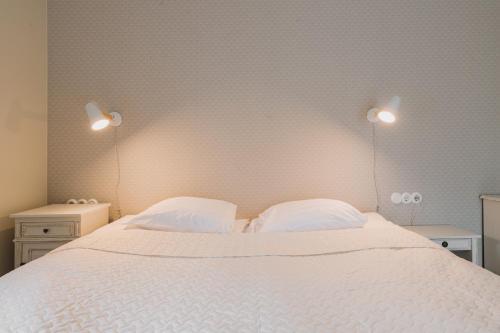 Кровать или кровати в номере Villa Fannyhof