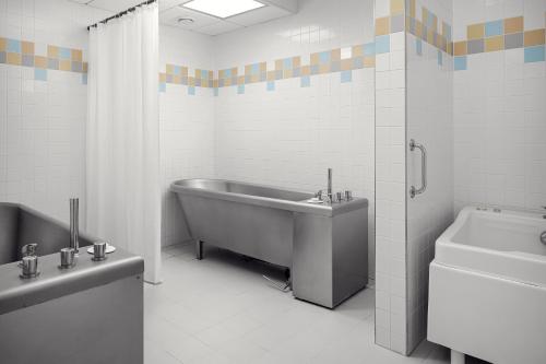 Ein Badezimmer in der Unterkunft Harvey Spa Hotel