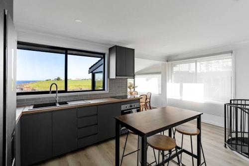 Dapur atau dapur kecil di Pia's Paradise Kiama
