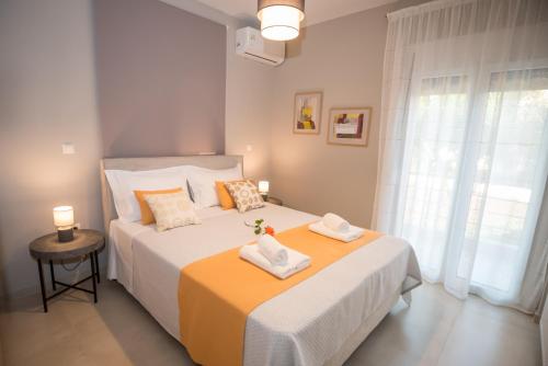 Postel nebo postele na pokoji v ubytování Maistros Home
