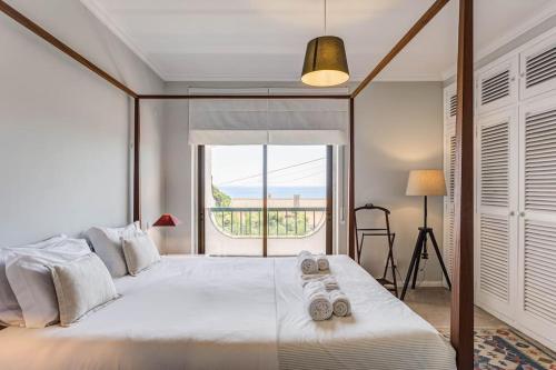 Postel nebo postele na pokoji v ubytování Tailor Made Villa with Ocean View in Caxias
