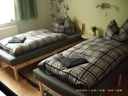 Postel nebo postele na pokoji v ubytování scheels-ferienwohnung