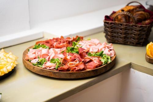a pizza sitting on top of a counter at Hotel Arko in Prague