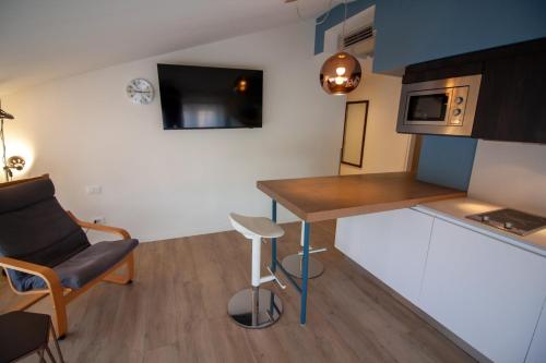 Cuisine ou kitchenette dans l'établissement Hotel Oliva