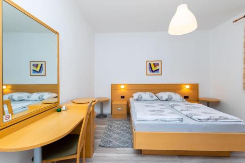 Posteľ alebo postele v izbe v ubytovaní Apartments Angel