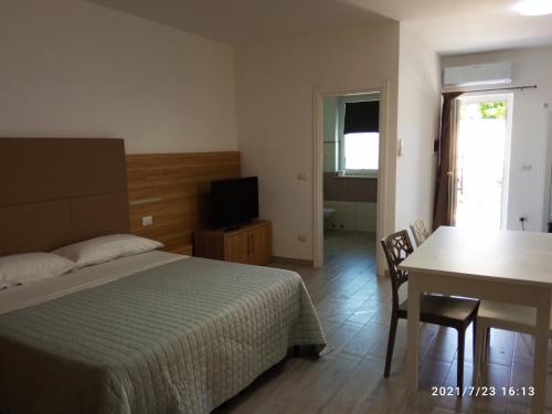 Postel nebo postele na pokoji v ubytování Casa Pizzarelli