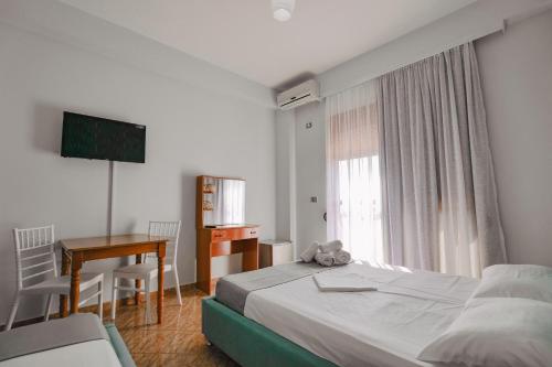 Postel nebo postele na pokoji v ubytování Hotel Panorama