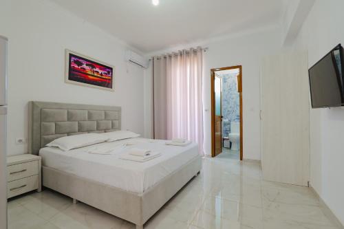 Llit o llits en una habitació de Vila Flori
