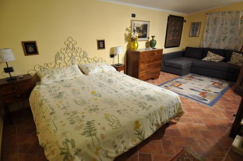 Posteľ alebo postele v izbe v ubytovaní B&B Le Balze
