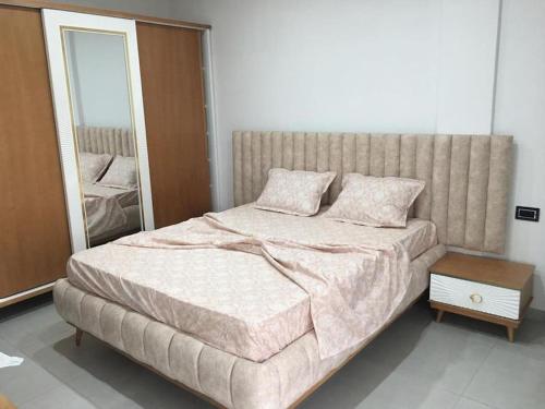 Appartement Sousse Sahloul 4 tesisinde bir odada yatak veya yataklar