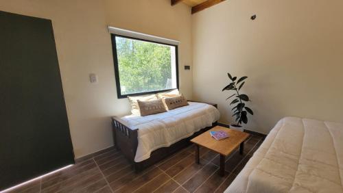 Llit o llits en una habitació de La Pituca del Monte