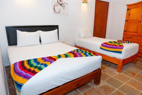 Cama o camas de una habitación en Matan Kaan