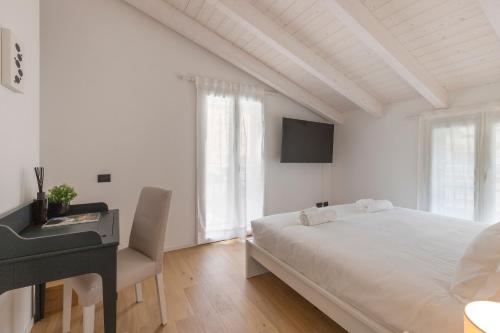 Cama o camas de una habitación en Olmo Suites