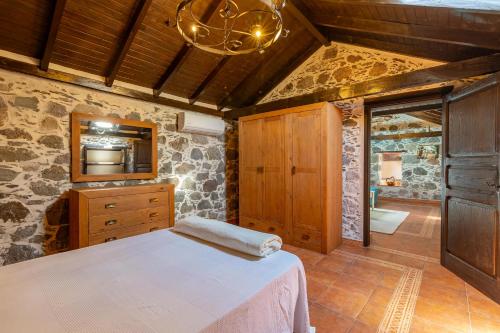 Ένα ή περισσότερα κρεβάτια σε δωμάτιο στο Casa Los Pinos