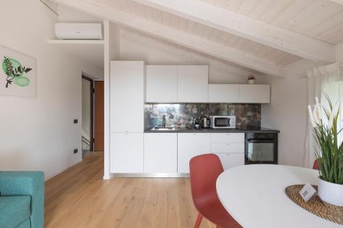 Una cocina o zona de cocina en Olmo Suites