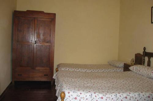 Tempat tidur dalam kamar di La casa della nonna