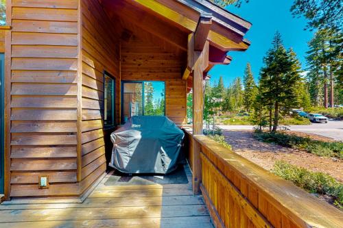 a porch of a wooden house with a tent on it at Epic Mountain Escape in Tahoe Vista