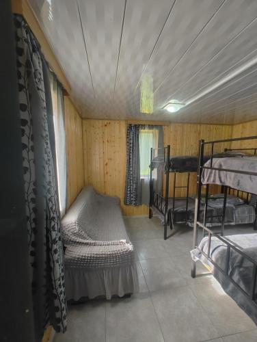 Postel nebo postele na pokoji v ubytování Hotel Veshagi